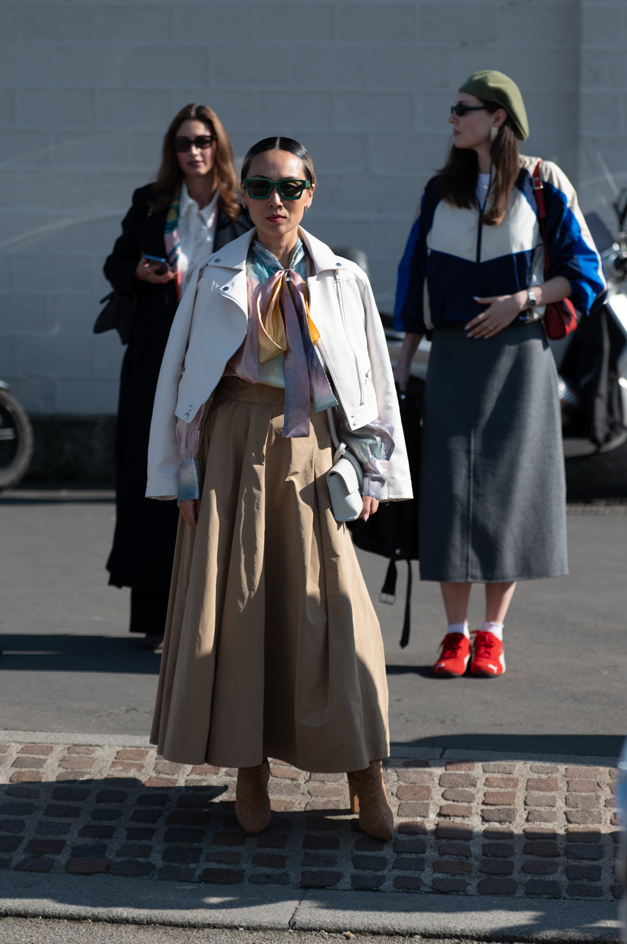 street style , all' arrivo gli ospiti della sfilata di Prada