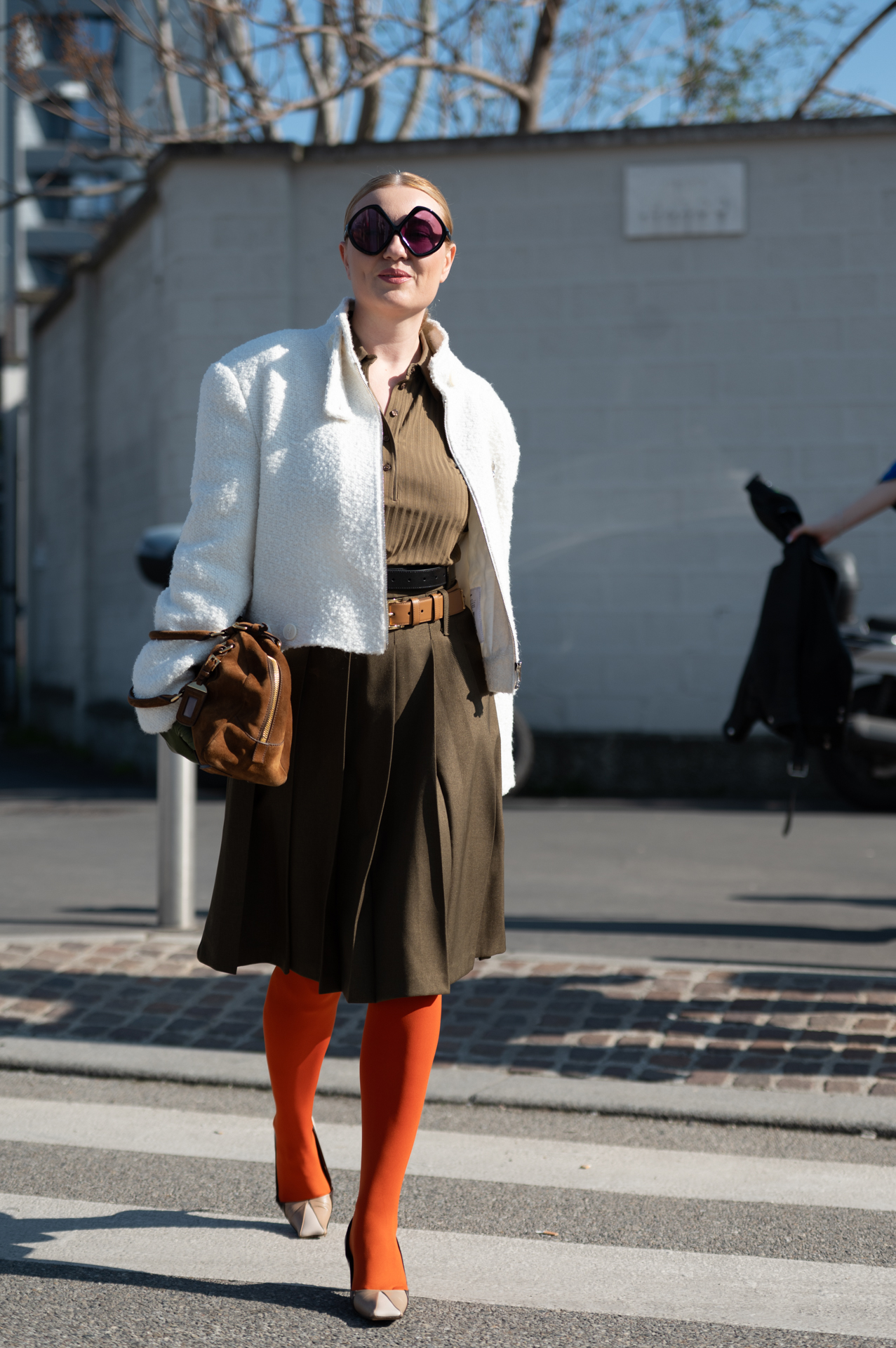 street style , all' arrivo gli ospiti della sfilata di Prada