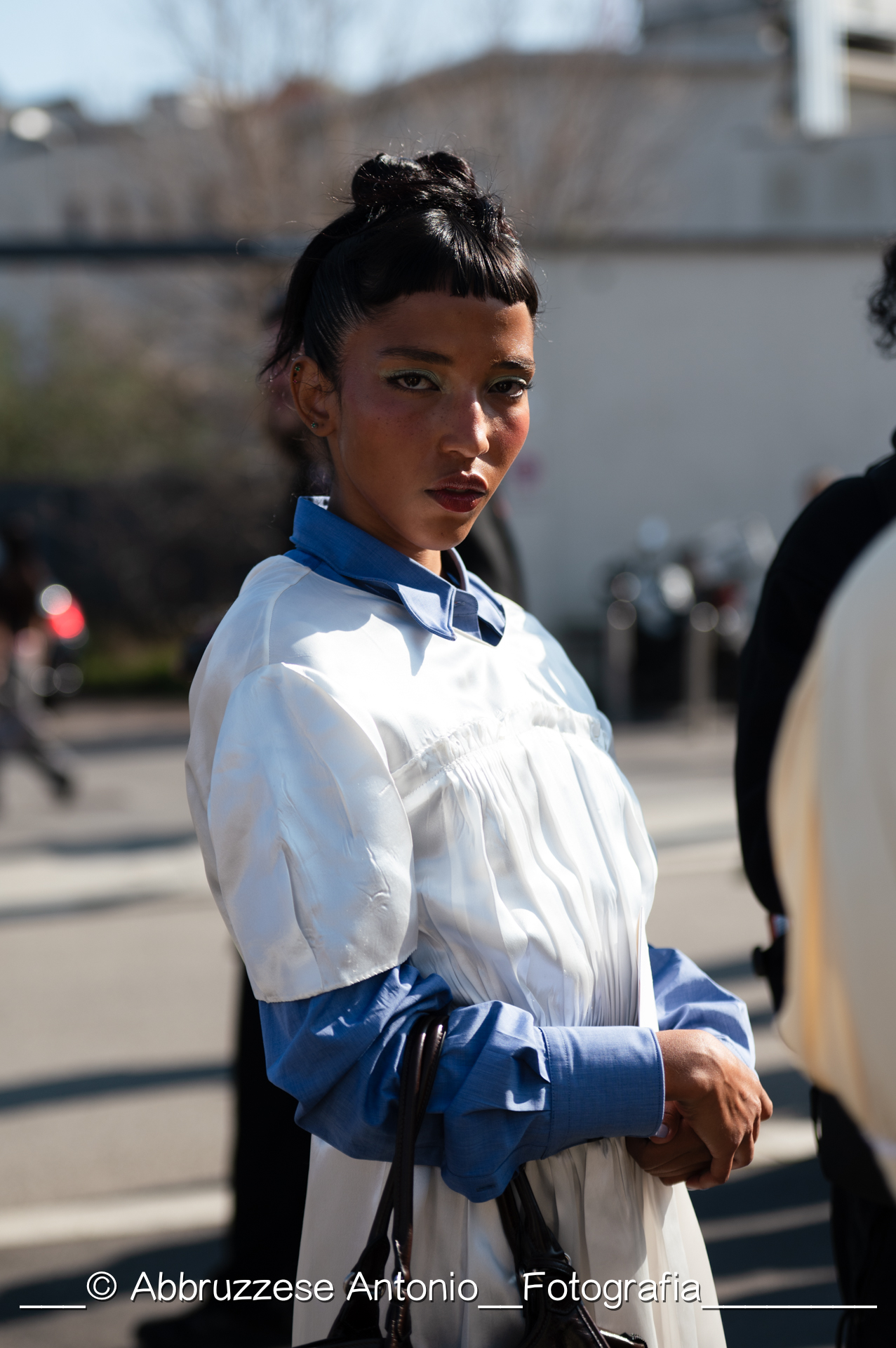 street style , all' arrivo gli ospiti della sfilata di Prada