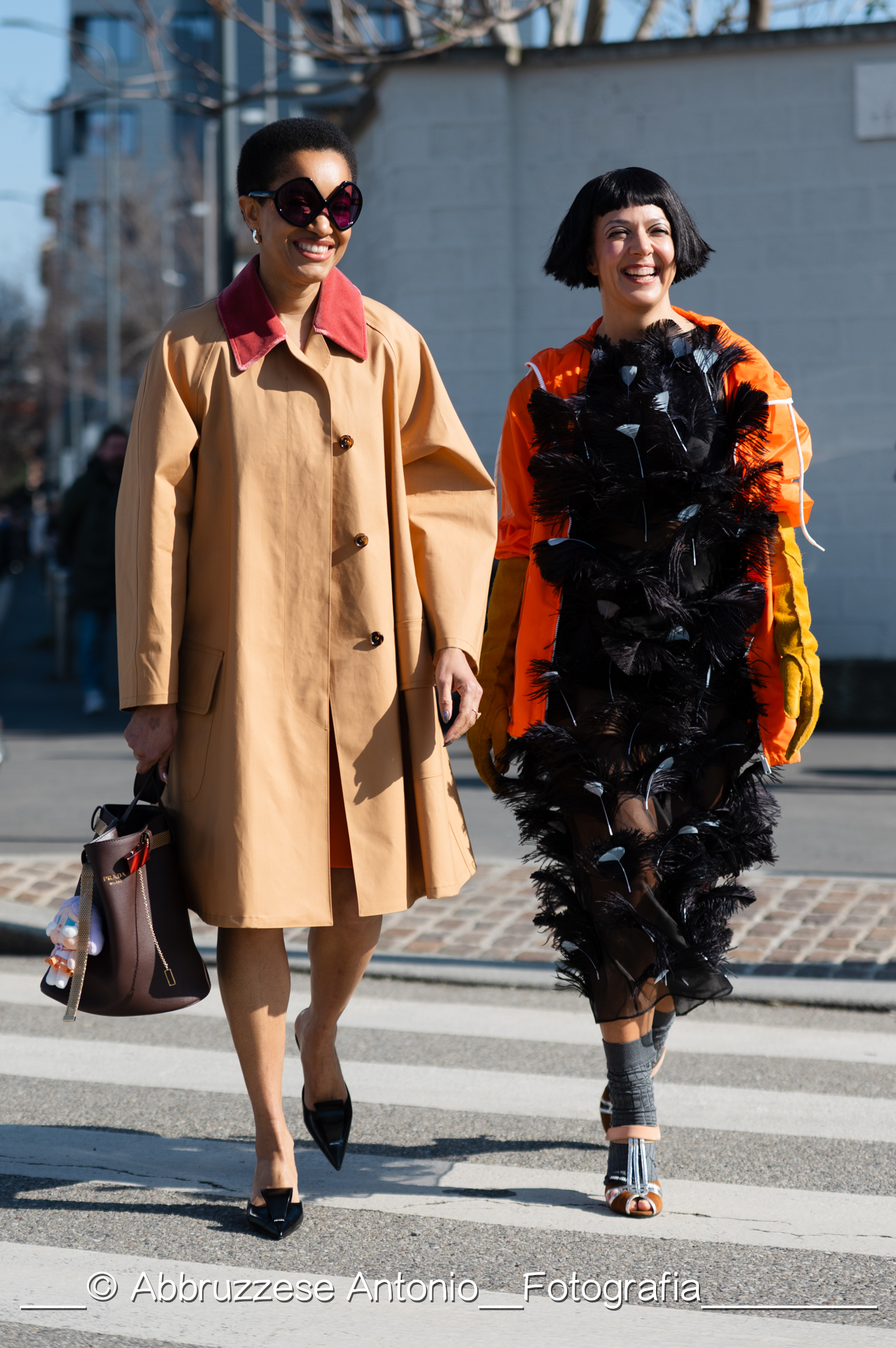 street style , all' arrivo gli ospiti della sfilata di Prada