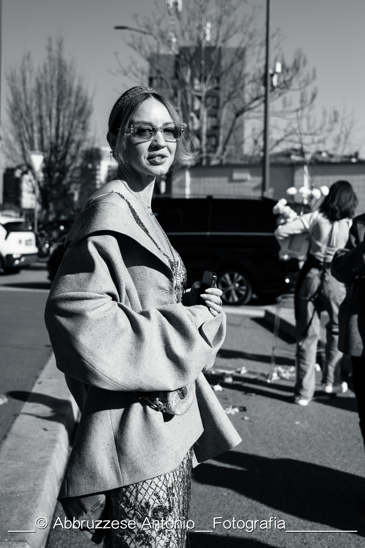 street style , all' arrivo gli ospiti della sfilata di Prada