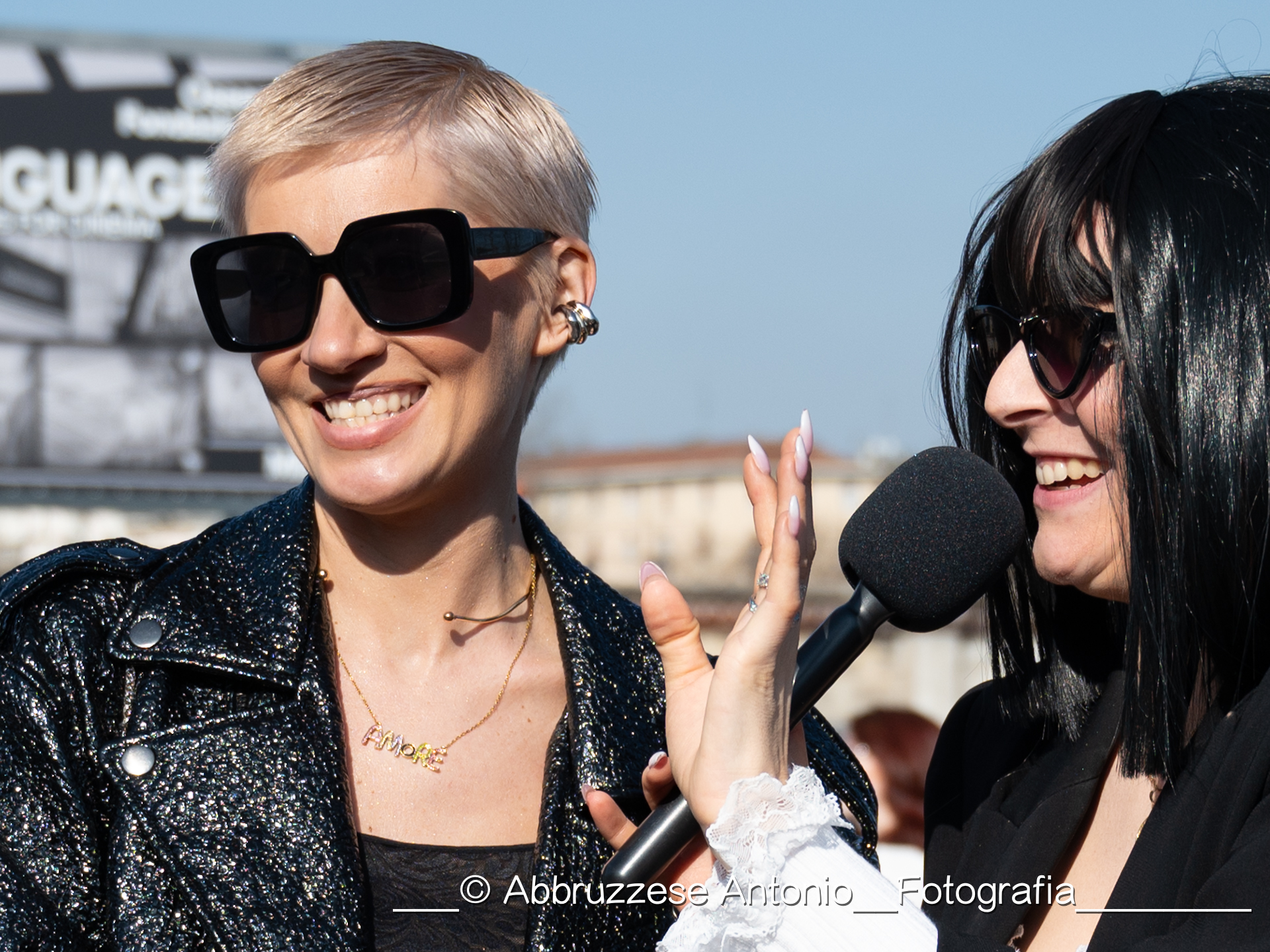 street style , all' arrivo gli ospiti della sfilata di Prada